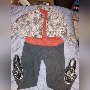 Leopard Print Jacket with Orange Top and Gray Pants